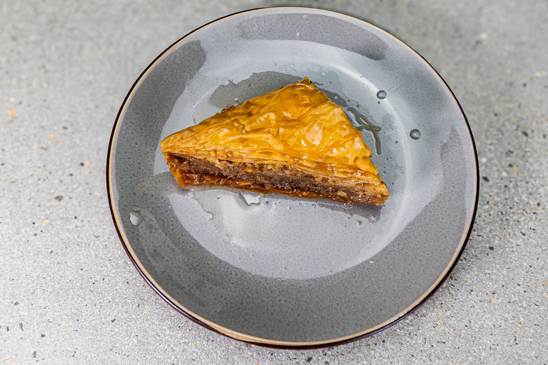 Baklava – layers of filo pastry filled with chopped nuts and sweetened with golden syrup – Cristina's Greek Souvlaki Daventry
