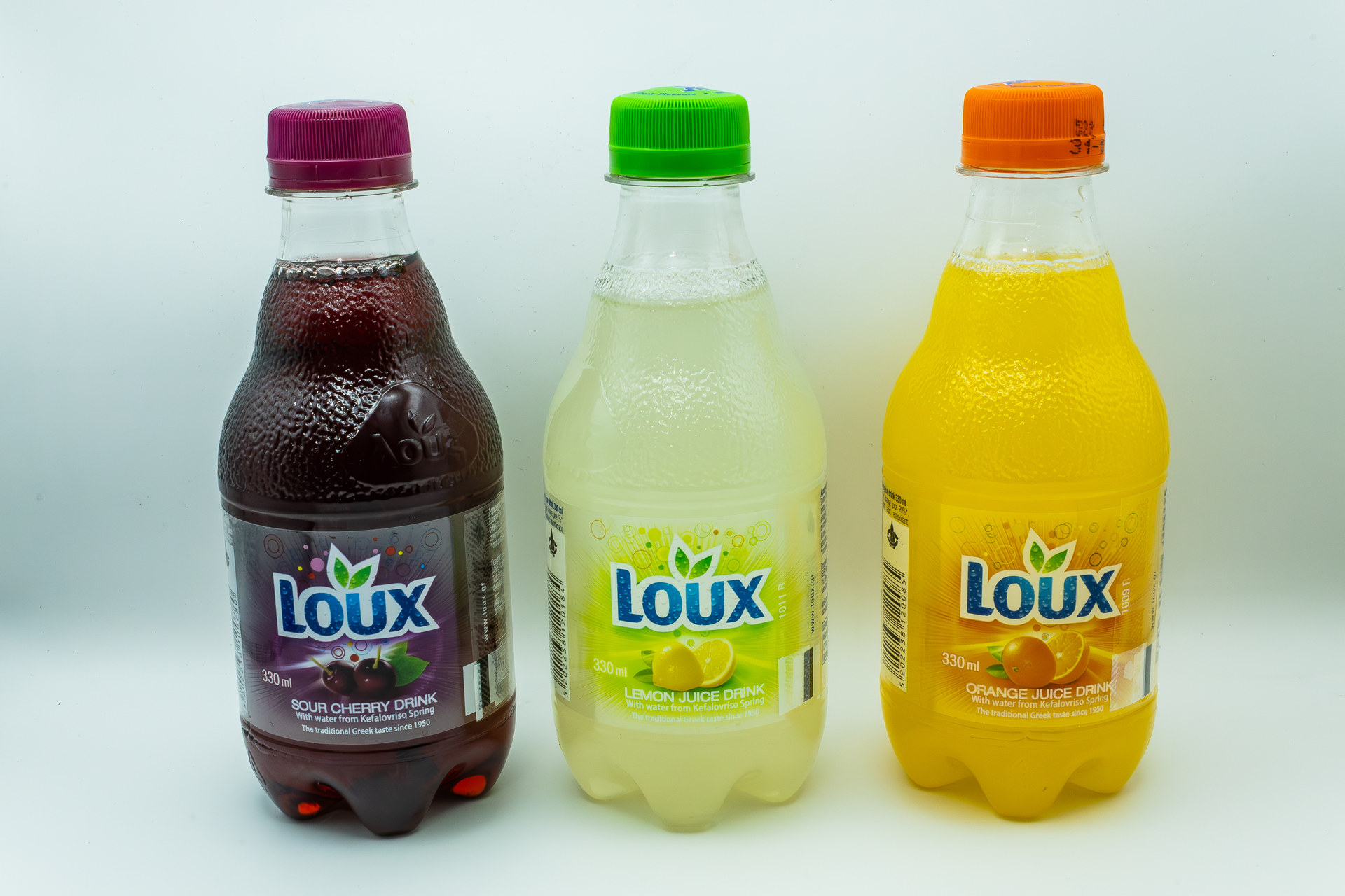 Loux Orange – authentic Greek soft drink 330ml can – Cristina's Greek Souvlaki Daventry