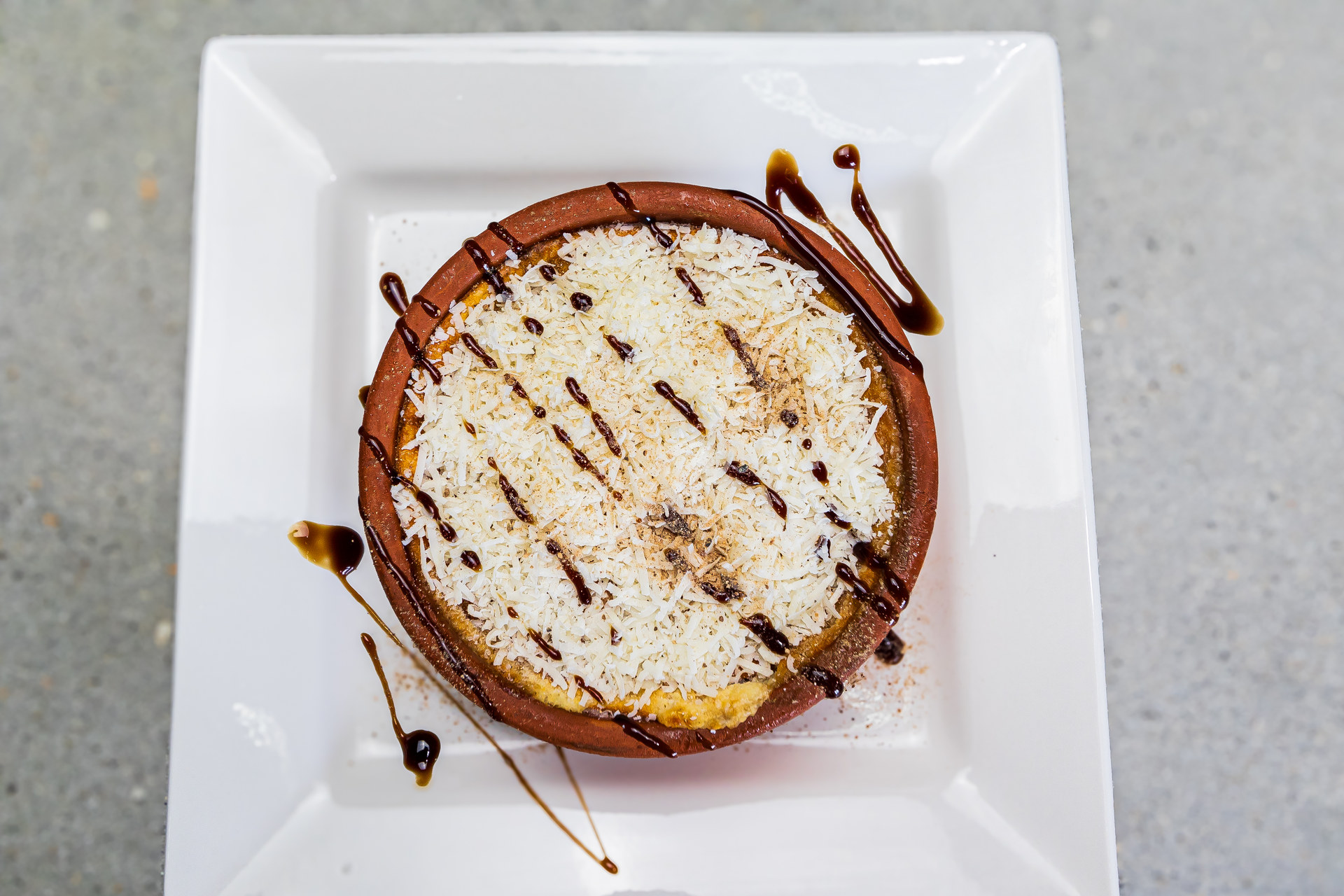 Traditional Greek moussaka baked in clay pot with minced pork, aubergine, bechamel and parmesan cheese – Cristina's Greek Souvlaki Daventry