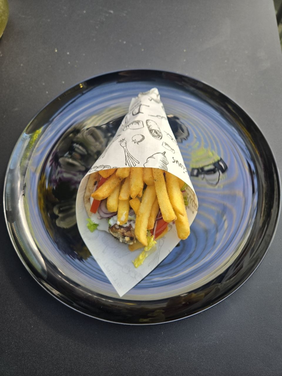 Pitta wrap with kebab Philadelphia skewer, tzatziki, tomato, onion, lettuce and french fries - Cristinas Greek Souvlaki Daventry