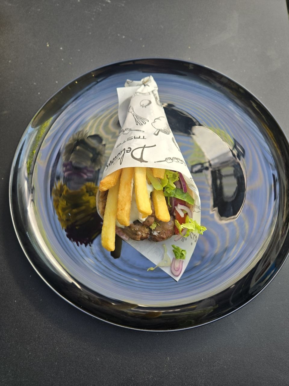 Pitta wrap with pork souvlaki skewer, tzatziki, tomato, onion, lettuce and french fries - Cristinas Greek Souvlaki Daventry
