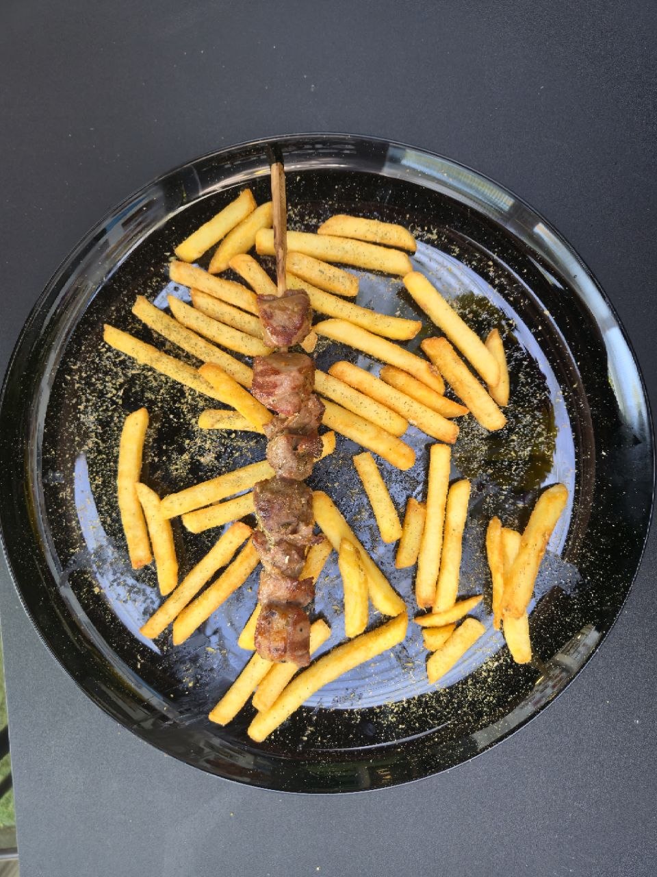 Single lamb souvlaki skewer served with french fries - Cristinas Greek Souvlaki Daventry