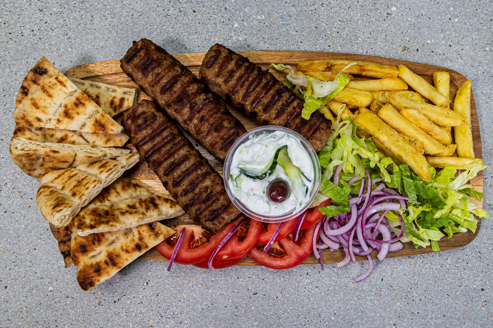 3 kebab Philadelphia skewers served with pitta, french fries and homemade tzatziki – Cristina's Greek Souvlaki Daventry