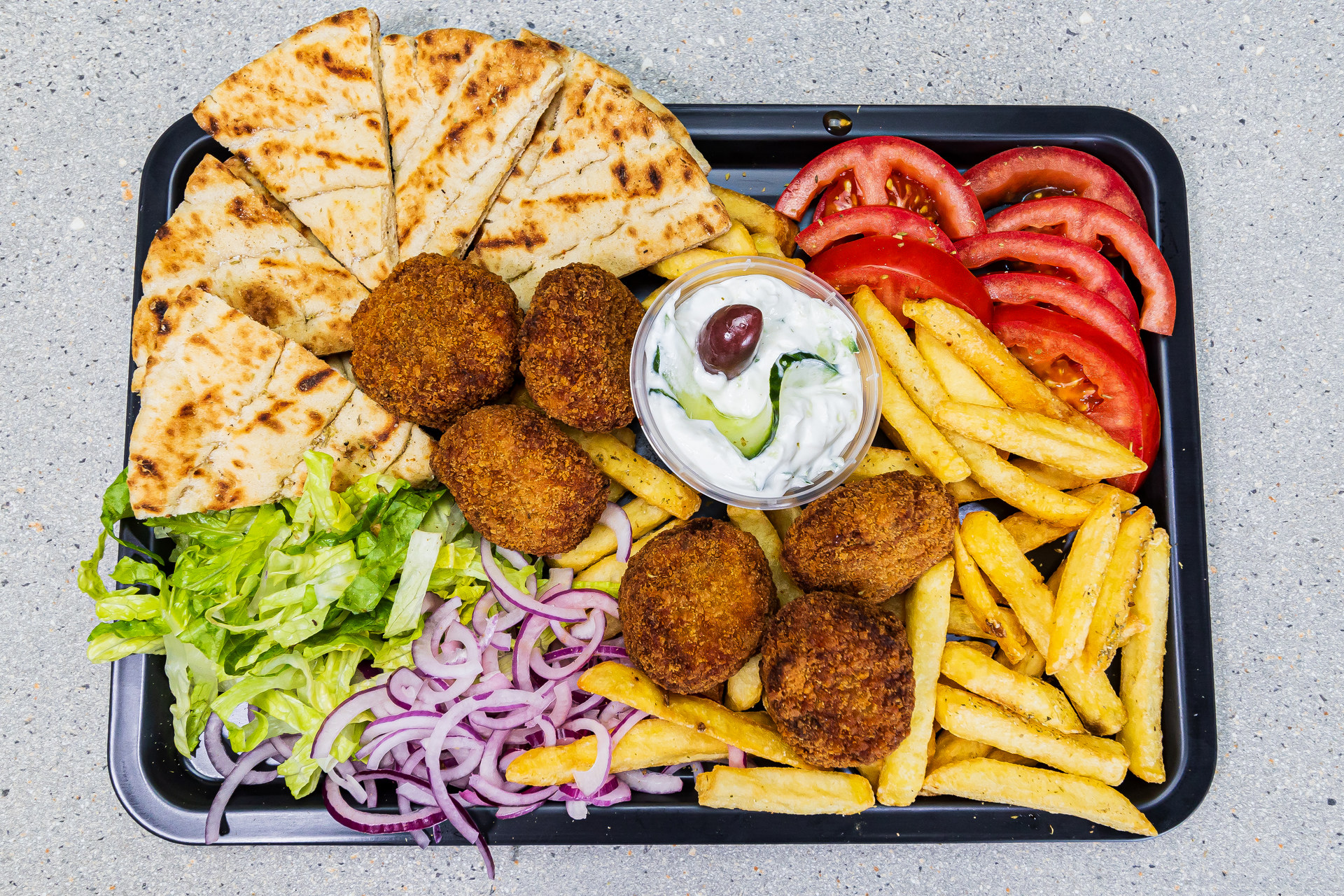 5 zucchini croquettes served with pitta bread, fries, tzatziki, tomato, onion and lettuce – Cristina's Greek Souvlaki Daventry